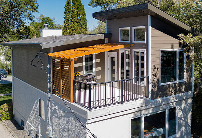 second story expanded deck reno Exterior Renovation - Home Additions Winnipeg - Winnipeg Exterior Renovations - All Canadian Renovations Ltd.