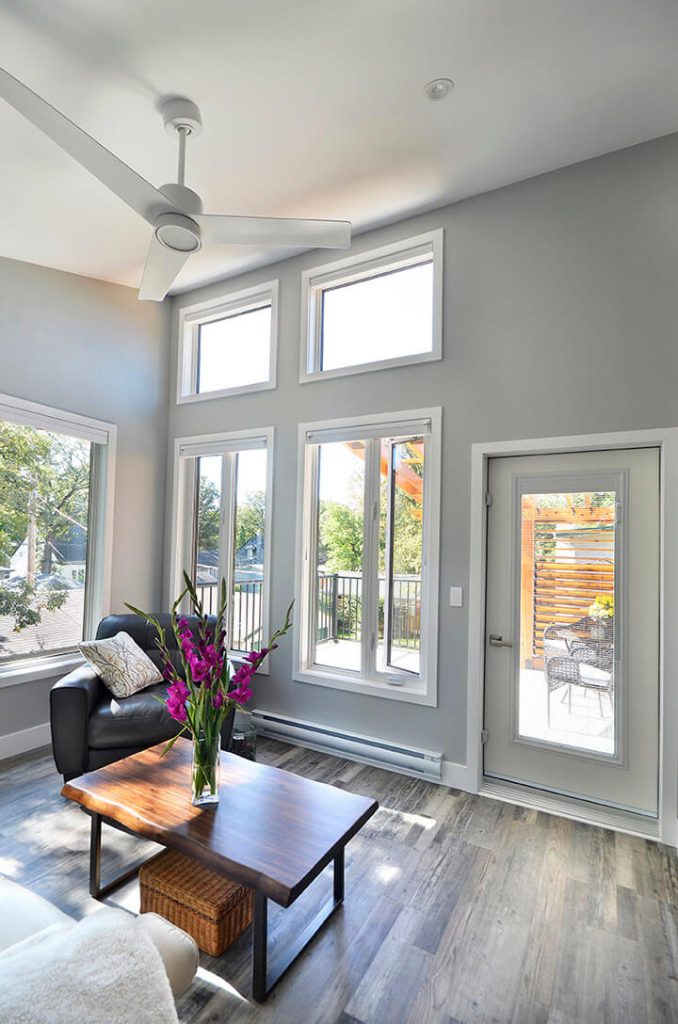 ceiling fan wonderfully lit and designed room Exterior Renovation - Home Additions Winnipeg - Winnipeg Exterior Renovations - All Canadian Renovations Ltd.