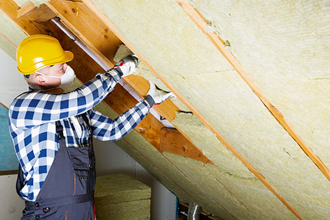 insulation in attic spaceEnergy-efficient insulation upgrade in your home - five energy-efficient renovations to reduce your utility costs | All Canadian Renovations Ltd.