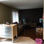 dark living room about to get a renovation makeover