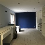 during a renovation, drywall in progress, electrical work completed roughed in