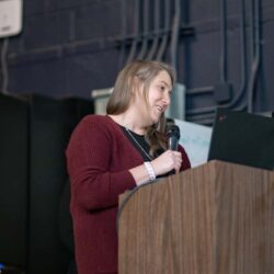 speaker on the stages of life podium