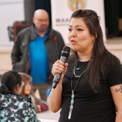 woman talking on the mic