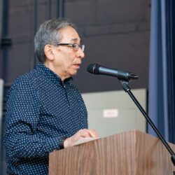 man at podium