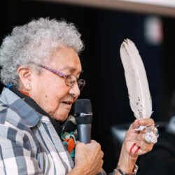 elder with feather