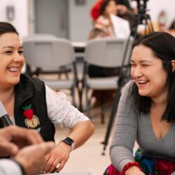 two women laughing